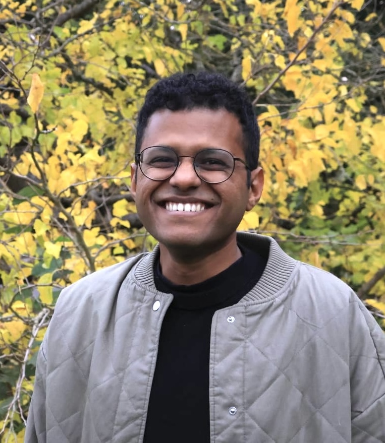 Portrait of Shreyas smiling outdoors
